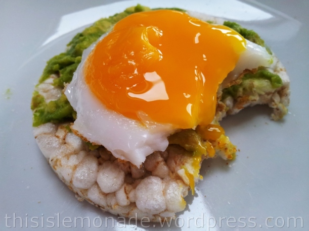 Duck egg and avocado on a rice cake